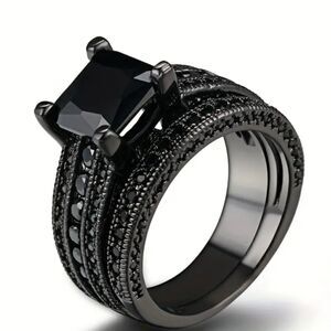 Brand New!! Black Cubic Zirconias surrounded by little black crystals. Size 7.
